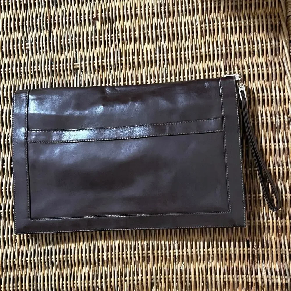 Vintage 1982 Lou Taylor wristlet envelope clutch and built in oval mirror. Brown